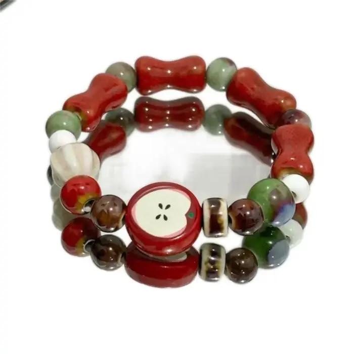 Bracelet en céramique de perles d'os de fruits multicolores fait à la main pour femmes, extensible, bijoux ethniques Boho pour occasions spéciales