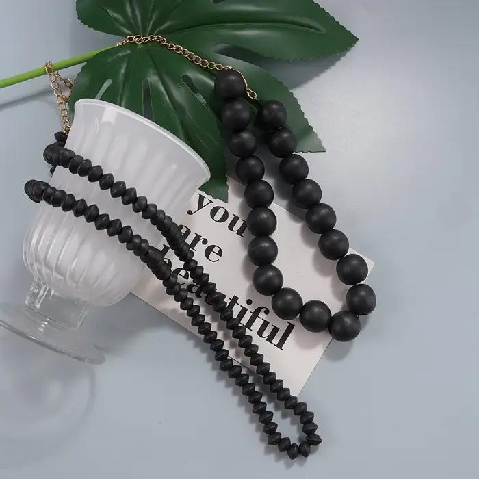 Collier superposé noir minimaliste moderne avec perles – Accessoire tendance pour les brunches et les tenues élégantes