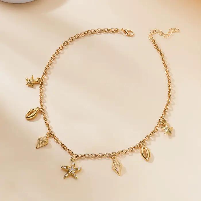 Collier pendentif étoile de mer et coquillage en zircon