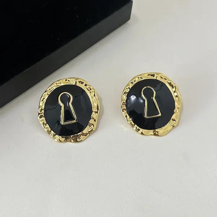 Boucles d'oreilles rondes en alliage émaillé noir exagéré pour femmes