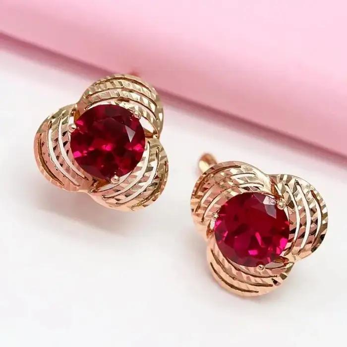 Boucles d'oreilles fleur incrustées d'or violet pour femme