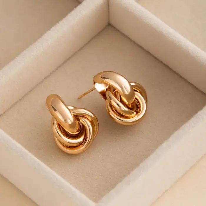 Boucles d'oreilles tendance en acier inoxydable avec nœuds épais pour femmes