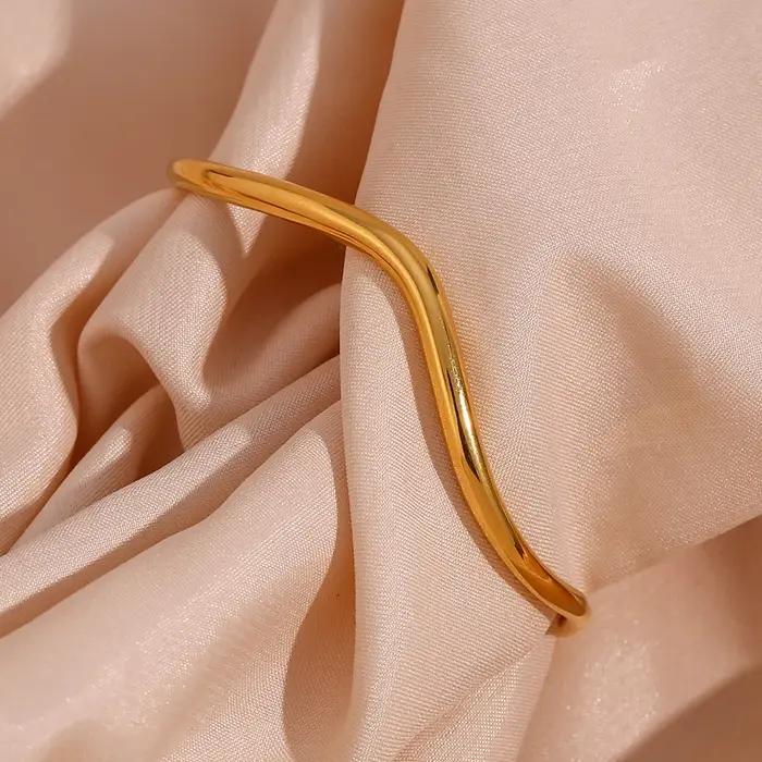 E.B.belle élégant irrégulier en forme de vague courbe ouverture bracelets en acier inoxydable pour femmes