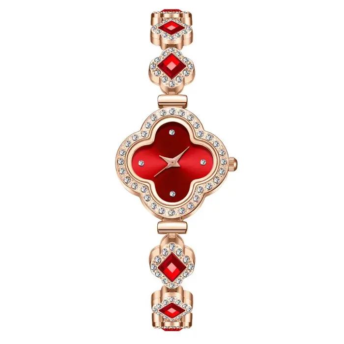 Montre bracelet trèfle avec incrustation de quartz et de diamants