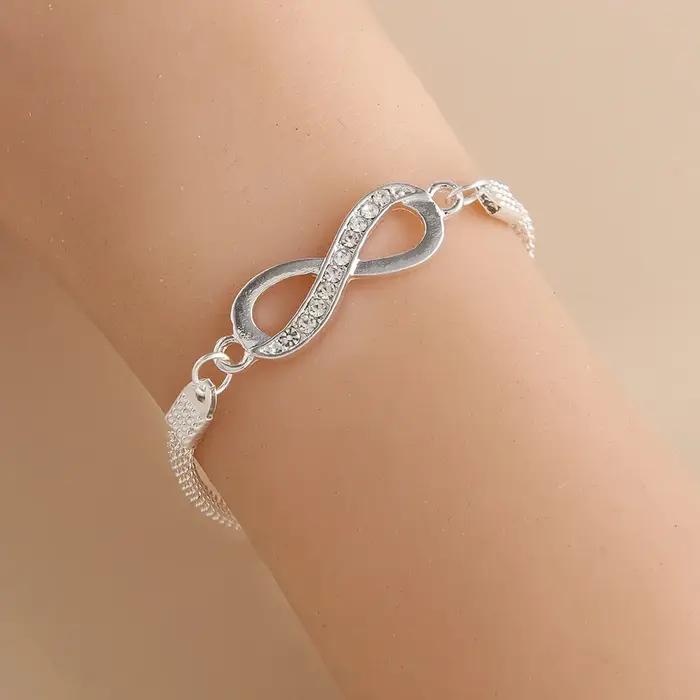 Bracelet en alliage avec strass en forme de croix