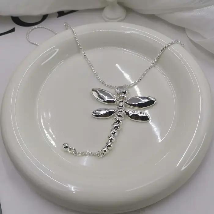Collier libellule en argent au Design Unique