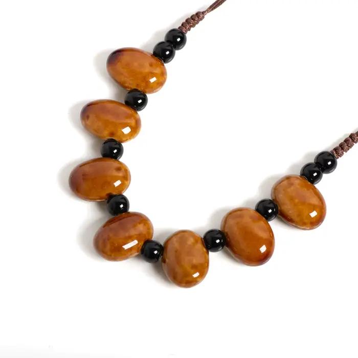 Collier en céramique de haricots ambres bohème ajustable pour femmes occasions spéciales cadeau vintage
