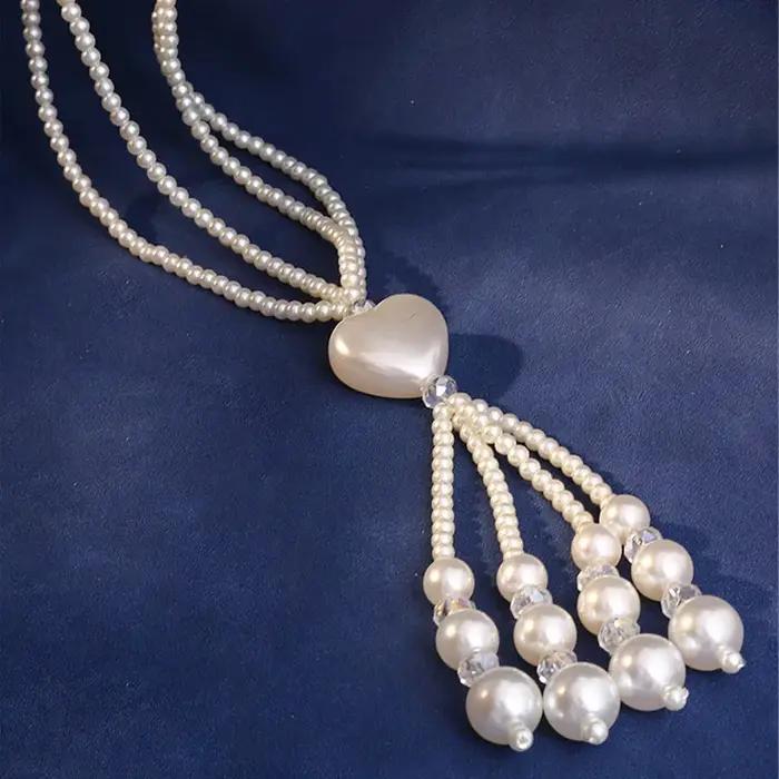 Collier de perles simulées presque rondes pour femmes, chaîne corde avec pendentif pompon, fait à la main pour les occasions spéciales