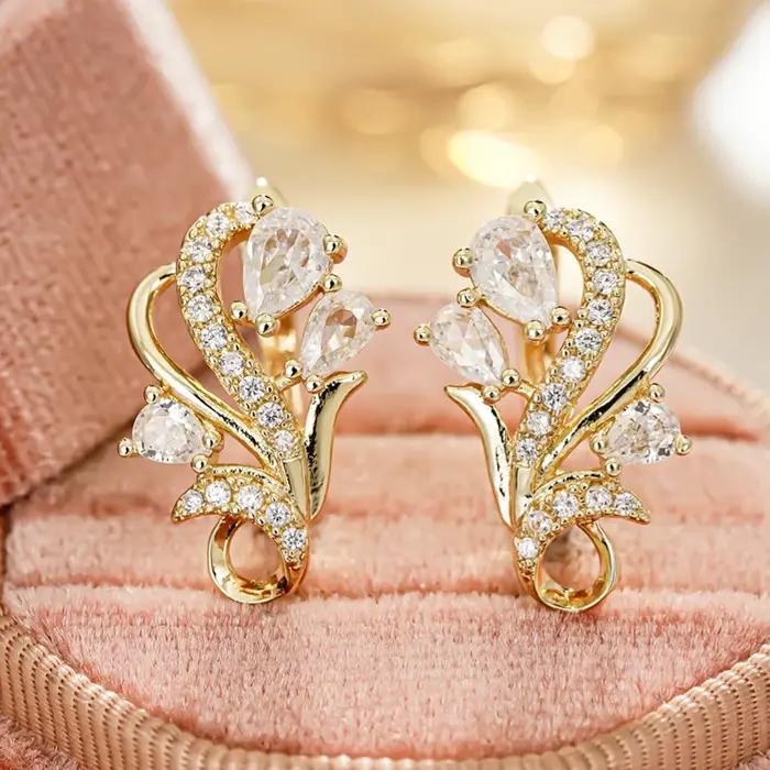 Boucles d'Oreilles Huitan en Forme de U Or Scintillant Fleurs Geometrique Luxe Mariage Zircone Cubique Nouveaux Bijoux Tendance Femme Occasions Spéciales