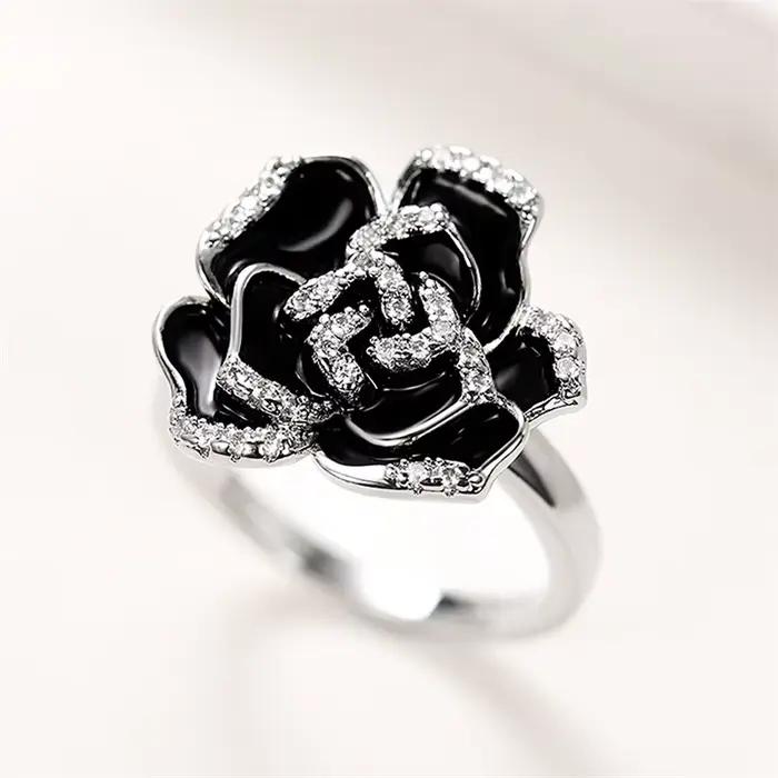 Bague Huitan en zircone cubique et émail noir, alliance romantique de camélia pour femmes, bijou de luxe pour occasions spéciales comme le mariage