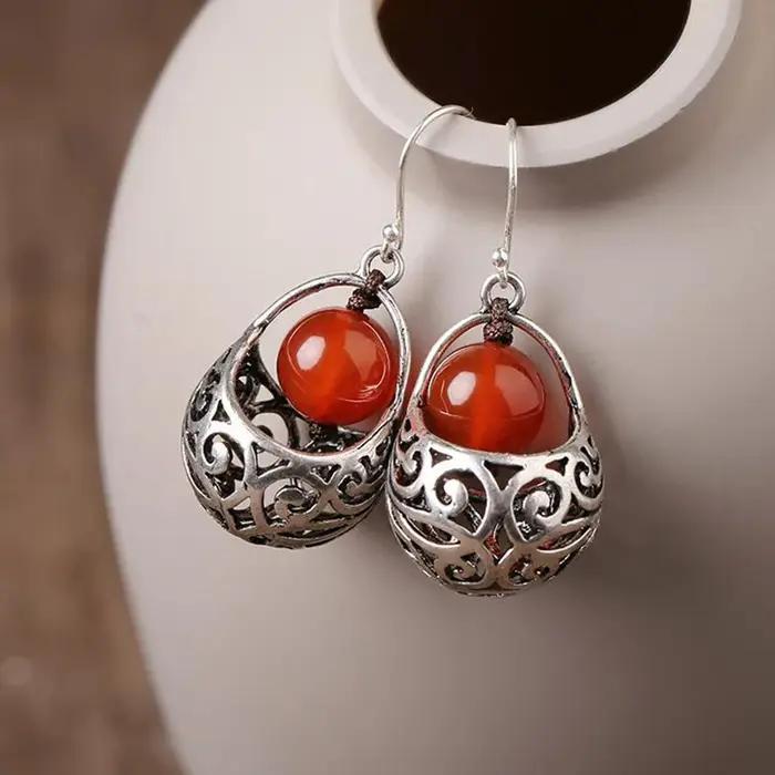 Boucles d'oreilles en placage d'argent serties de zirconium rouge style ethnique pour femmes occasions spéciales élégantes