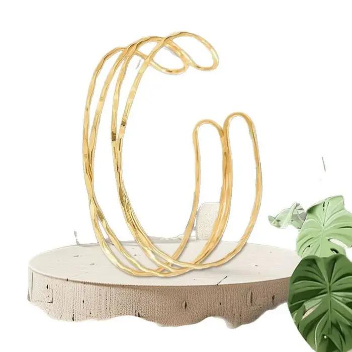 Bracelet de main ouvert réglable multi-couches ajouré à motif croisé