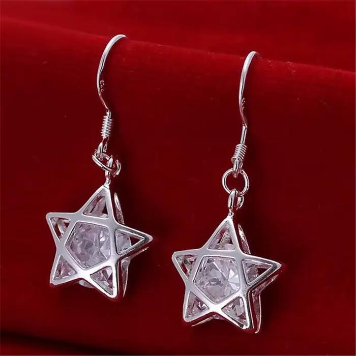Boucles d'oreilles classiques en or 18 carats avec cristal en forme d'étoile pour femme