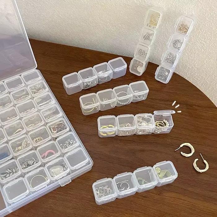 Boîte à bijoux transparente miniature de 28 pièces