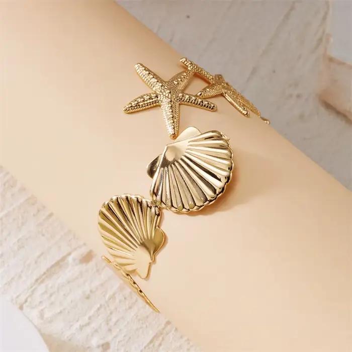 Bracelet de bras réglable forme coquillage étoile de mer femme bijoux vacances plage accessoire thème nautique océan fantaisie marine