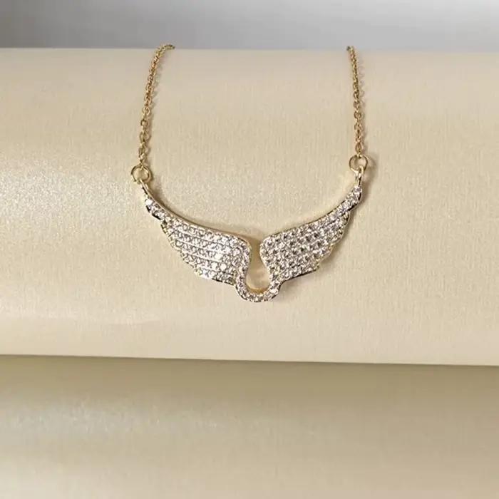 Collier pendentif ailes d'ange en or brillant
