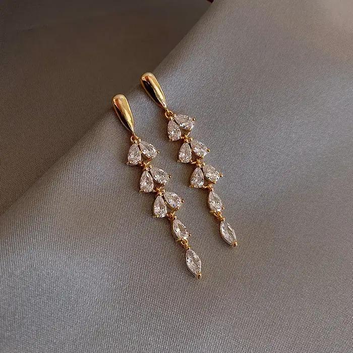Boucles d'oreilles dorées brillantes en Zircon en forme de feuille pour femmes