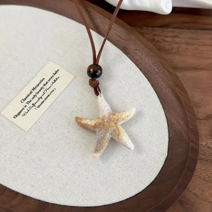 Collier pendentif coquillage style vacances en bord de mer