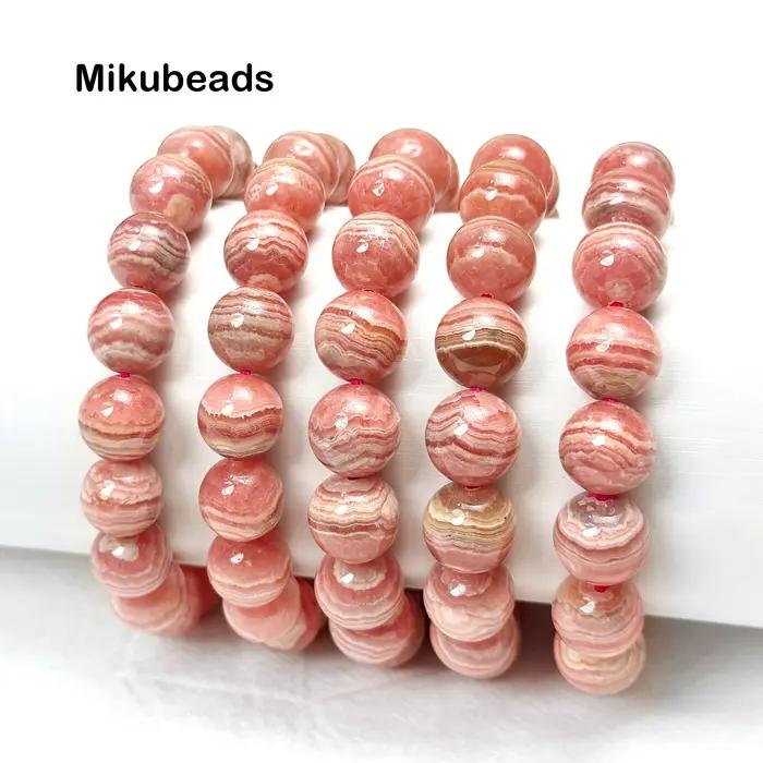 Perles rondes lisses en rhodochrosite naturelle 8-11.5mm 3A