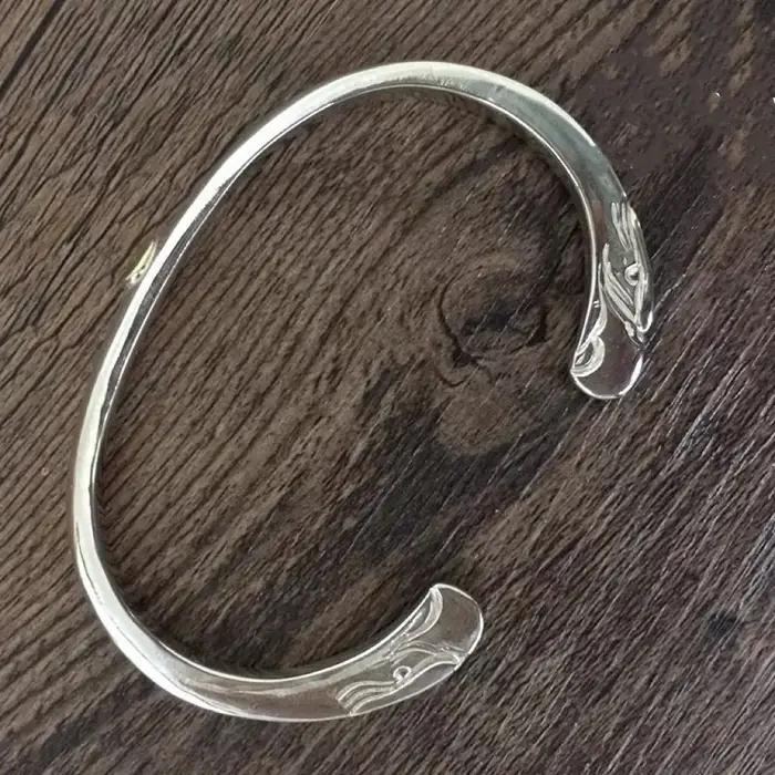 Bracelet vintage Goro's Aigle à quatre yeux en or pour couple