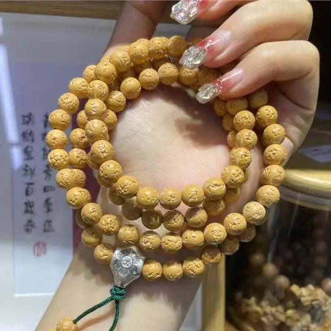 Bracelet multi-tours en perles rondes lisses marron