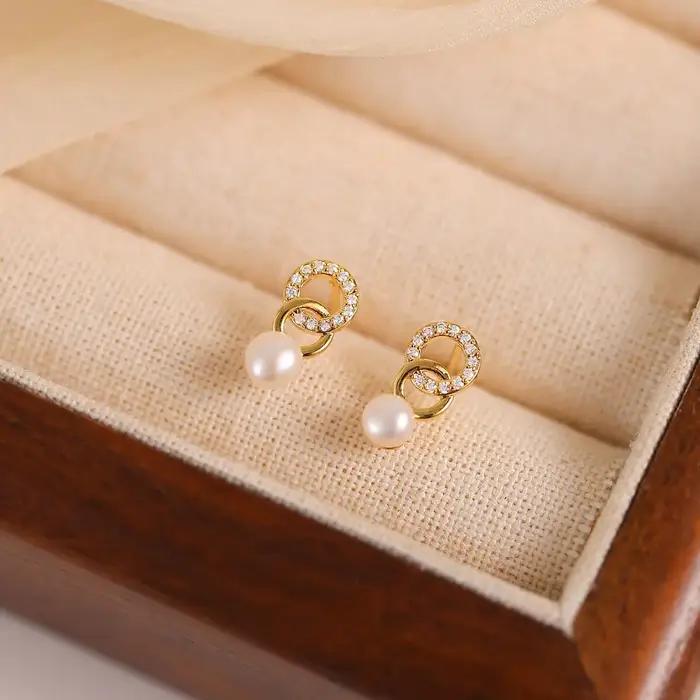 Boucles d'oreilles délicates de luxe, double anneau avec perle miniature, tendance, nouvelle collect