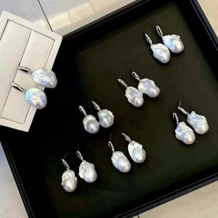 Boucle d'oreille en argent avec perles baroques d'eau douce certifiées