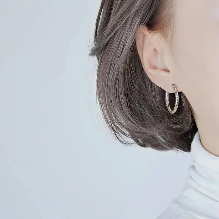 1 paire de boucles d'oreilles en acier inoxydable pour femmes