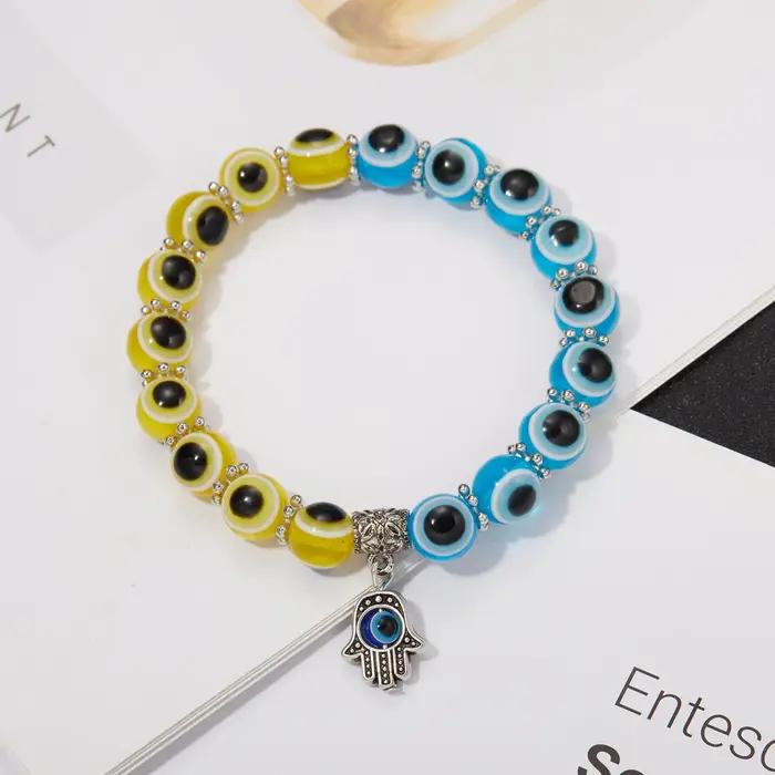 Bracelet mauvais œil bleu main de Fatima dinde mille yeux souhait fait