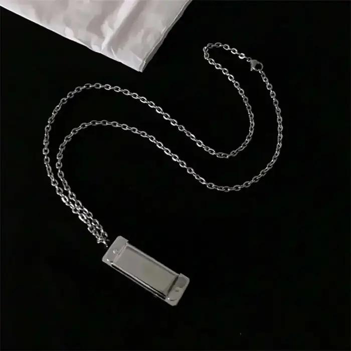 Mini-collier harmonica pour hommes et femmes, pendentif musical créatif qui peut produire du son, bijoux de mode au design de niche