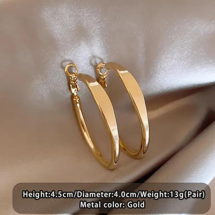 Boucles d'oreilles circulaires simples plaquées or 18 carats