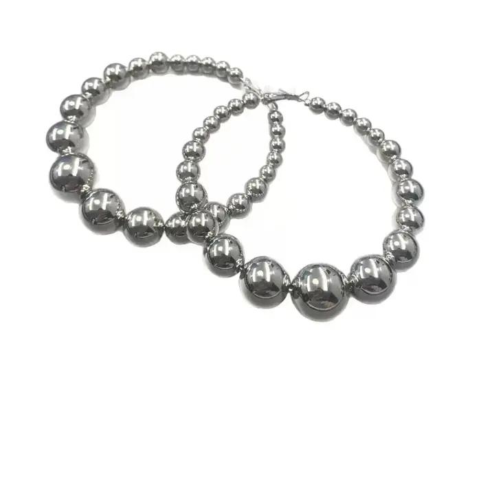 Boucle d'oreille rétro en perles CCB