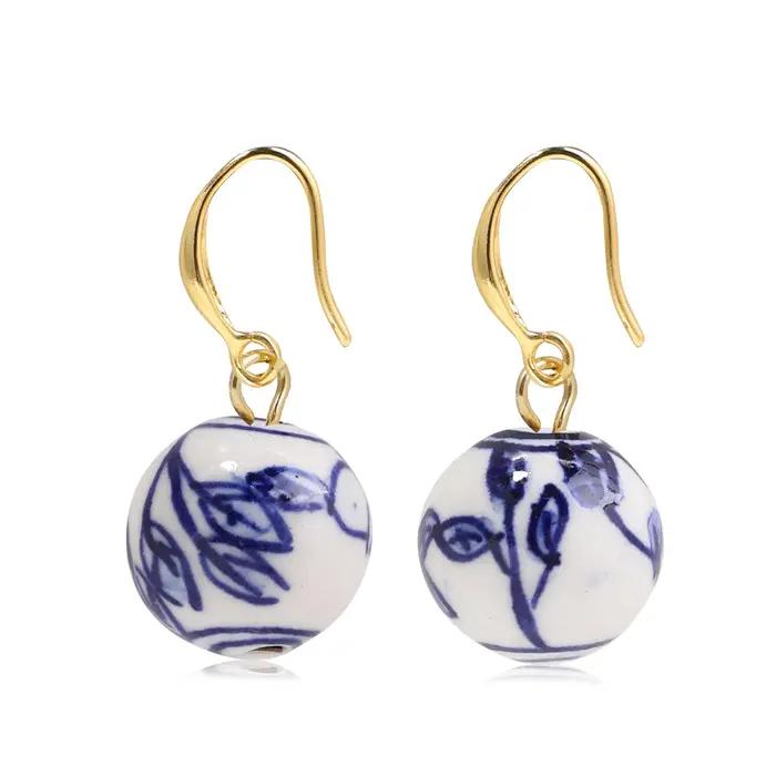 Boucles d'oreilles en céramique style rétro pour femmes avec certificat de qualité pour occasions sociales elegance et originalité