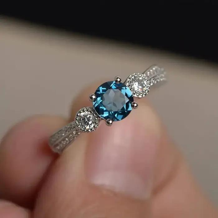 Bague de fiançailles en argent sterling avec topaze bleue pour femme, coupe ronde, cristal bleu, bag