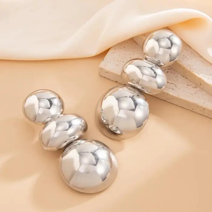 Boucles d'oreilles rondes géométriques rétro exagérées pour femmes