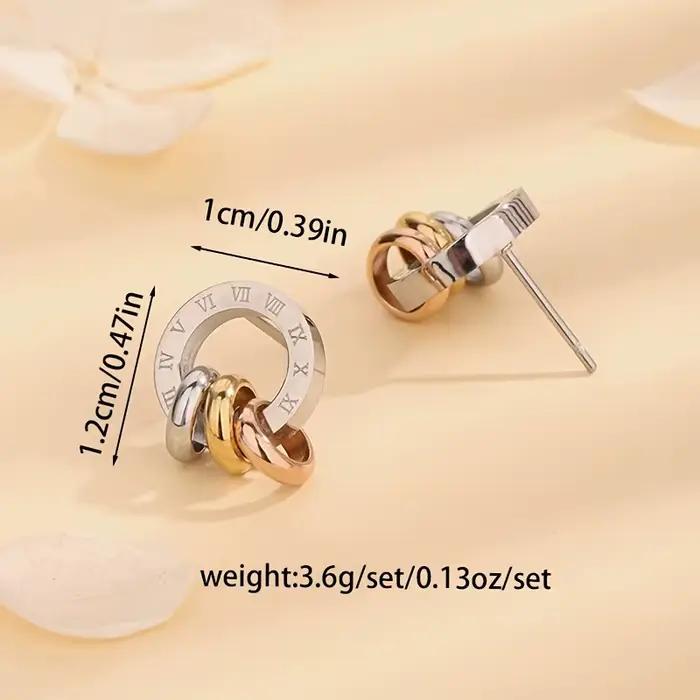 Bague bicolore argentée et boucles d'oreilles clous triple anneaux entrelacés en or massif avec chiffres romains