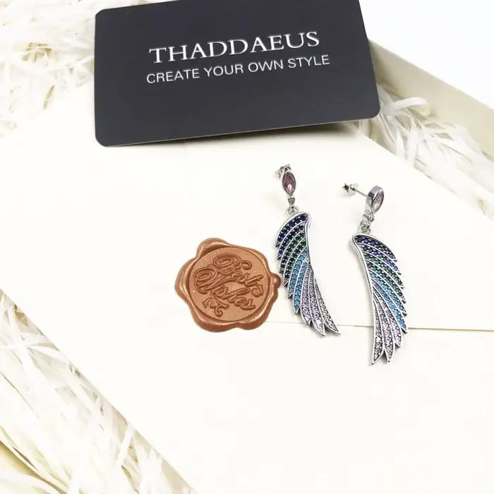 Boucles d'oreilles en forme d'aile d'oiseau