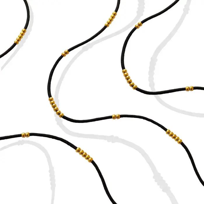 Collier en corde de tissu noir avec perles en acier inoxydable