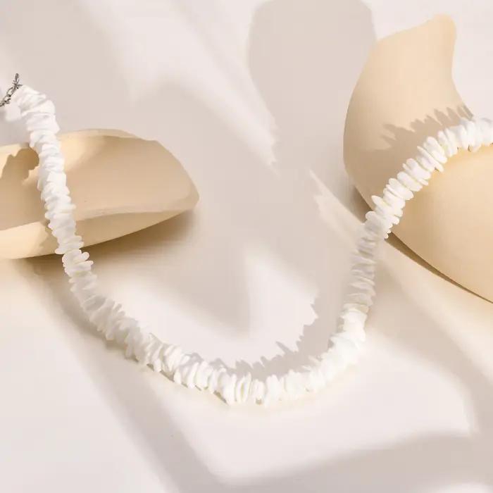 Collier bohème en chaîne de coquillage de Puka