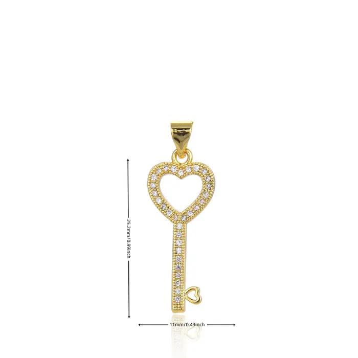Collier minimaliste en plaqué or avec pendentif en forme de cœur et clé creuse