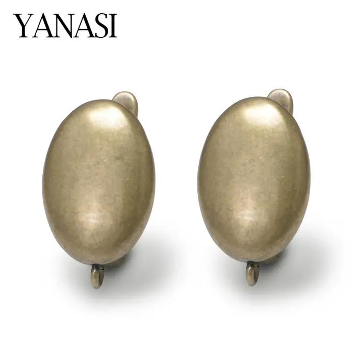 1 paire de boucles d'oreilles en Bronze Antique