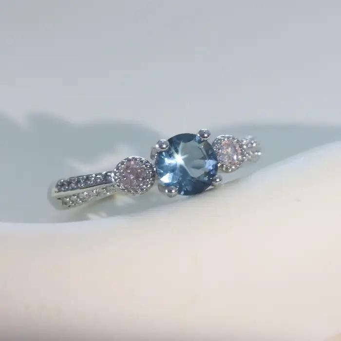 Bague de fiançailles en argent sterling avec topaze bleue pour femme