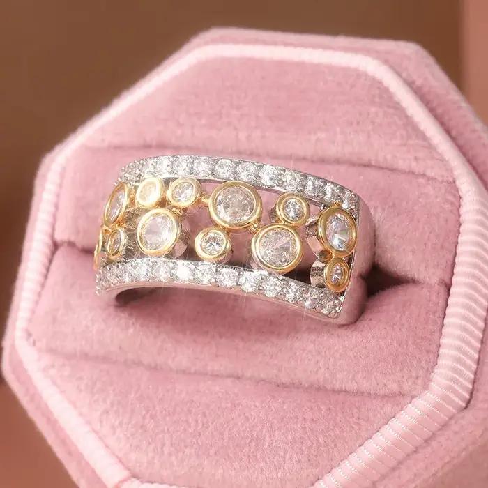 Magnifique bague pour femme bicolore incrustée de CZ blanc