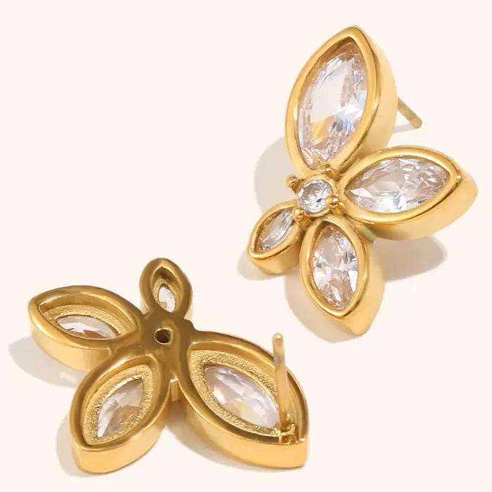 La. Boucles d'oreilles pour femmes en acier inoxydable avec fleurs géométriques Muses et zircon brillant