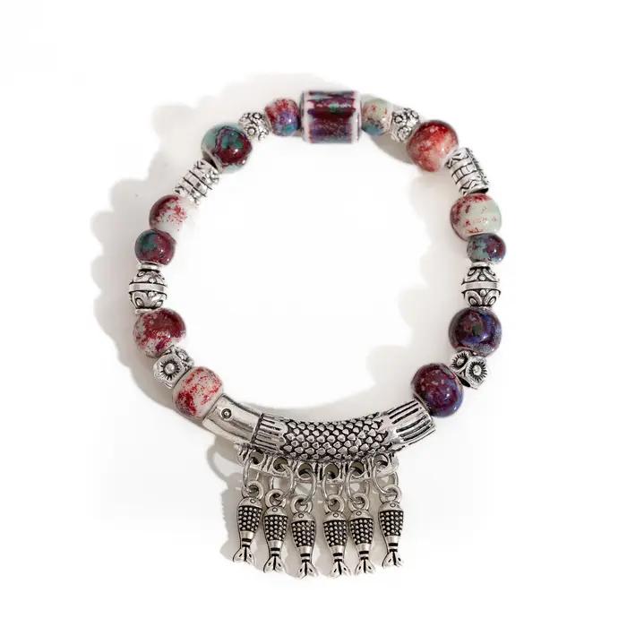 Bracelet élastique fait à la main avec perles en céramique et pendentif poisson en alliage, bijoux de Style ethnique S03-178