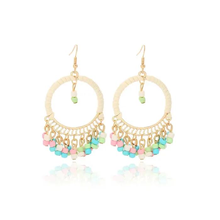 Boucles d'oreilles rondes à franges géométriques faites à la main