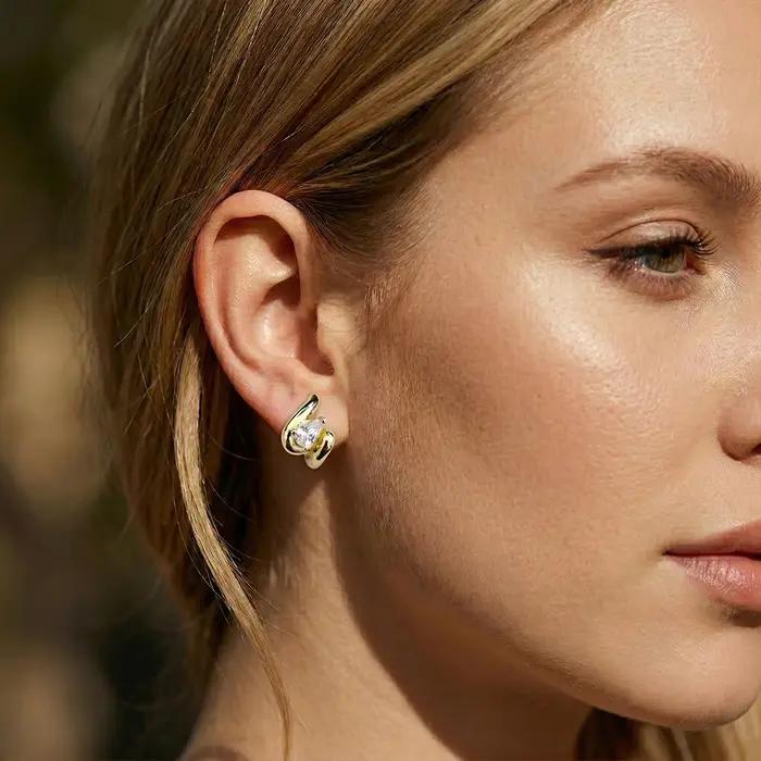 Moonmory – boucles d'oreilles chic en spirale dorée