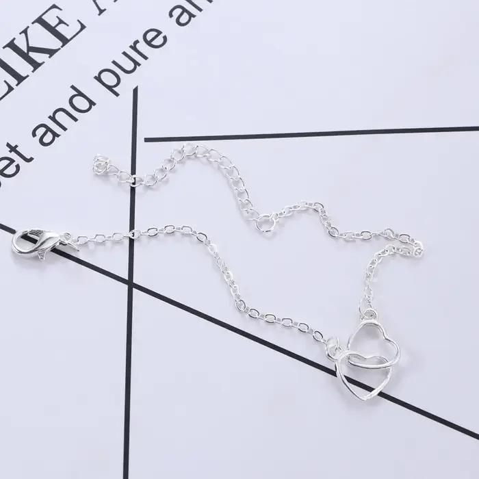 Parure de bijoux en strass : collier et boucles d'oreilles