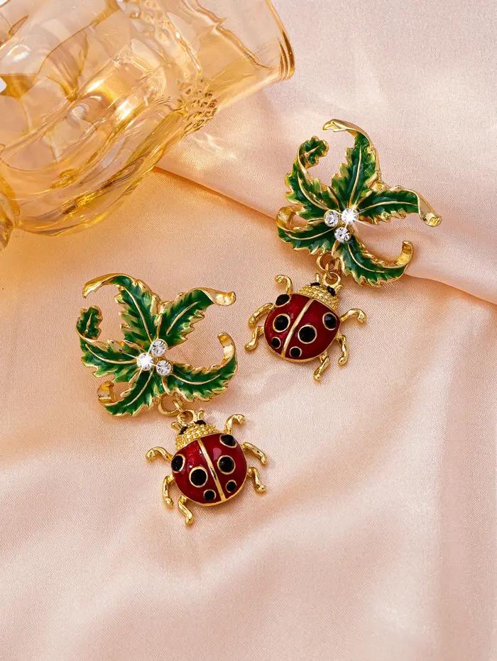1 paire de boucles d'oreilles pour femmes charmantes