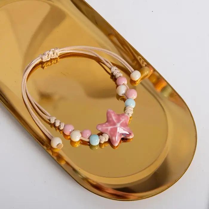 Bracelet en céramique étoile rose fait à la main pour femmes